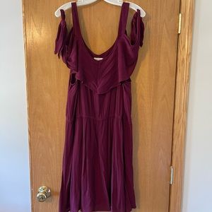 Knee length cold shoulder dress.